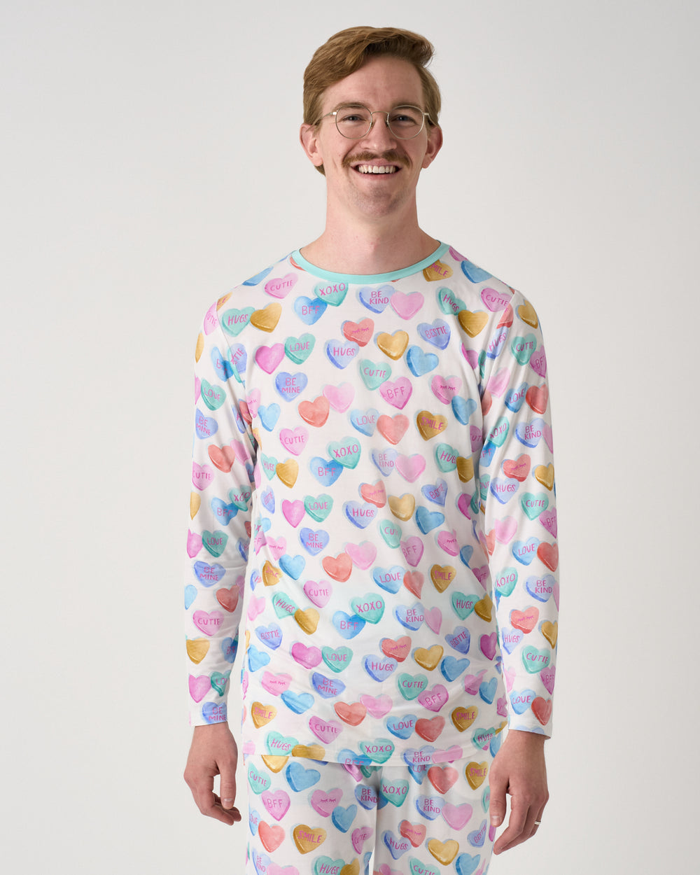 Man wearing the Candy Cuties Men's Long Sleeve Pajama Top