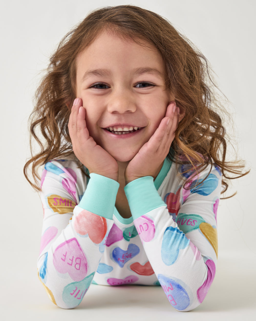 Posing girl wearing the Candy Cuties Two-Piece Pajama Set
