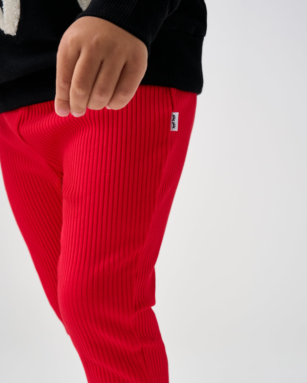 Close up of the ribbed detail on the Candy Red Ribbed Legging