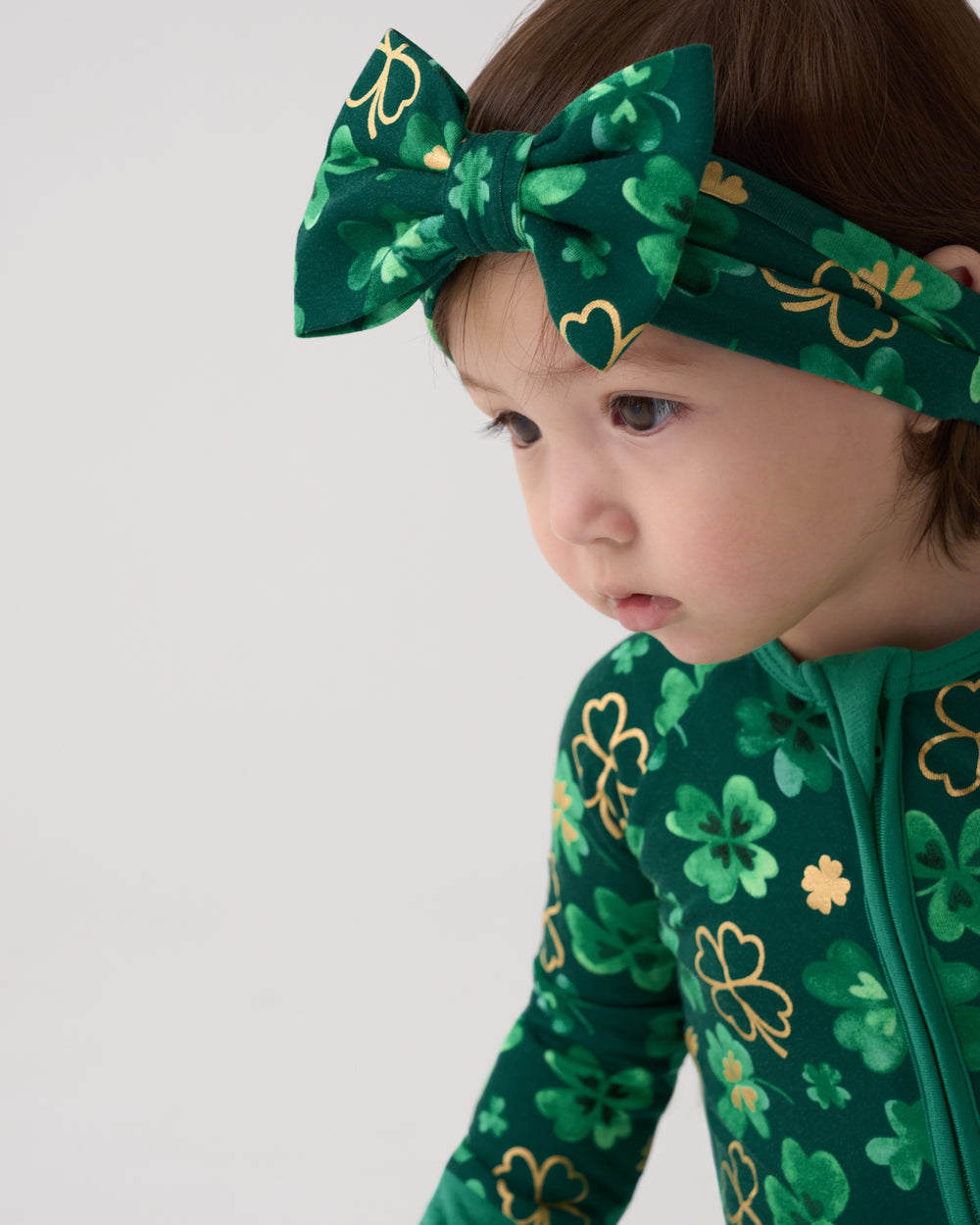 Close up of child wearing the Clover Cuties Luxe Bow Headband