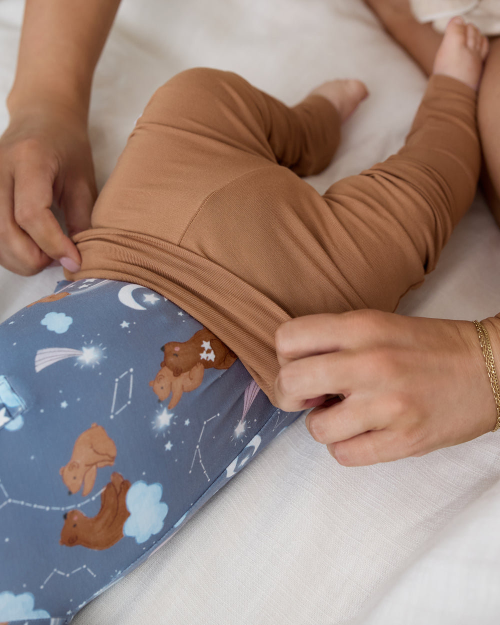 Adult demonstrating the fold over waistband on the Chestnut Brown Fold Over Legging