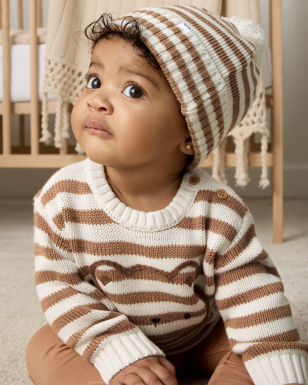 Sitting baby wearing the Chestnut Brown Stripe Sweater Beanie Hat and Sweater