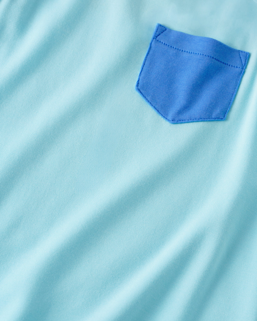 Close up of the pocket detail on the Coastal Blue Pocket Tank