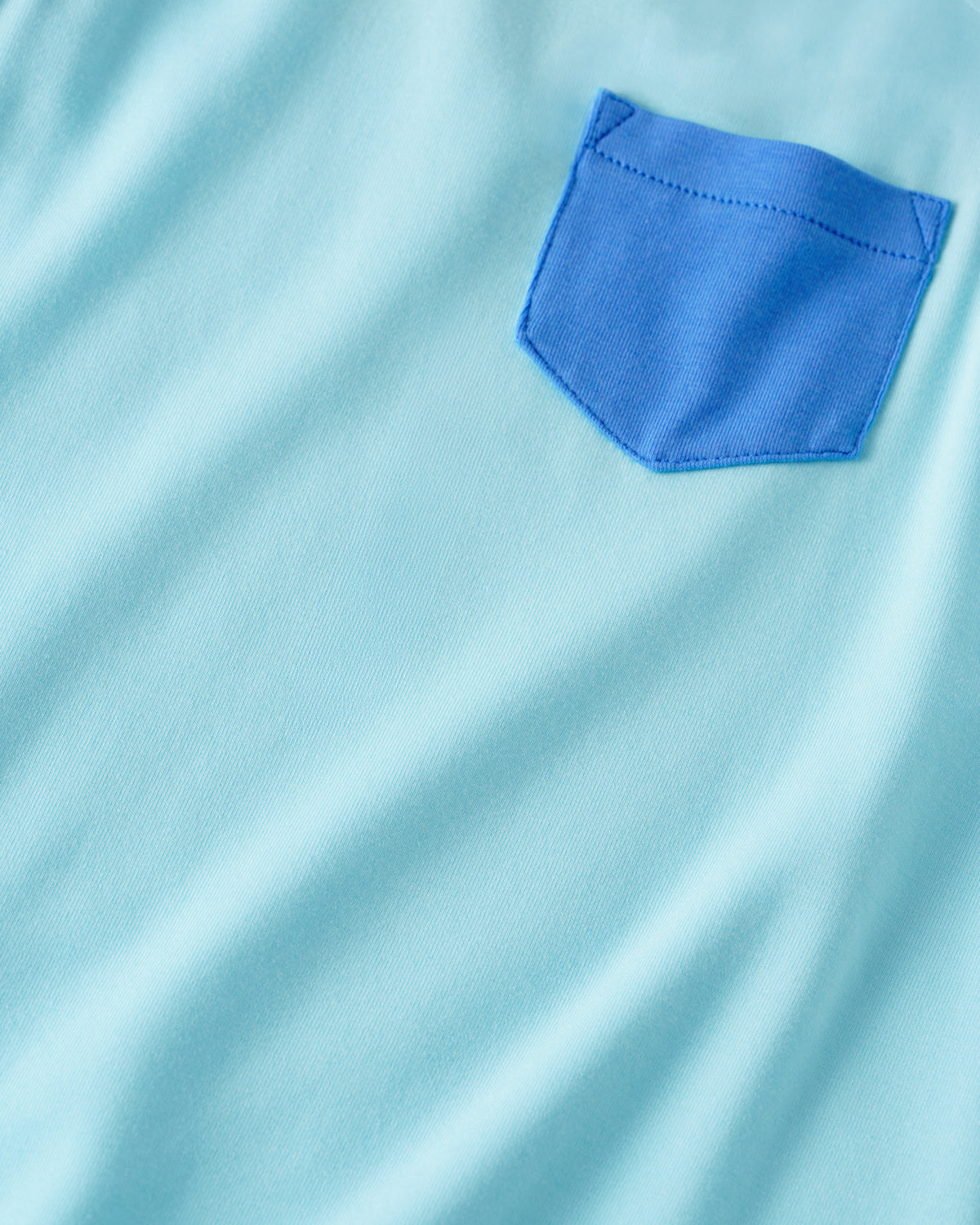 Close up of the pocket detail on the Coastal Blue Pocket Tank