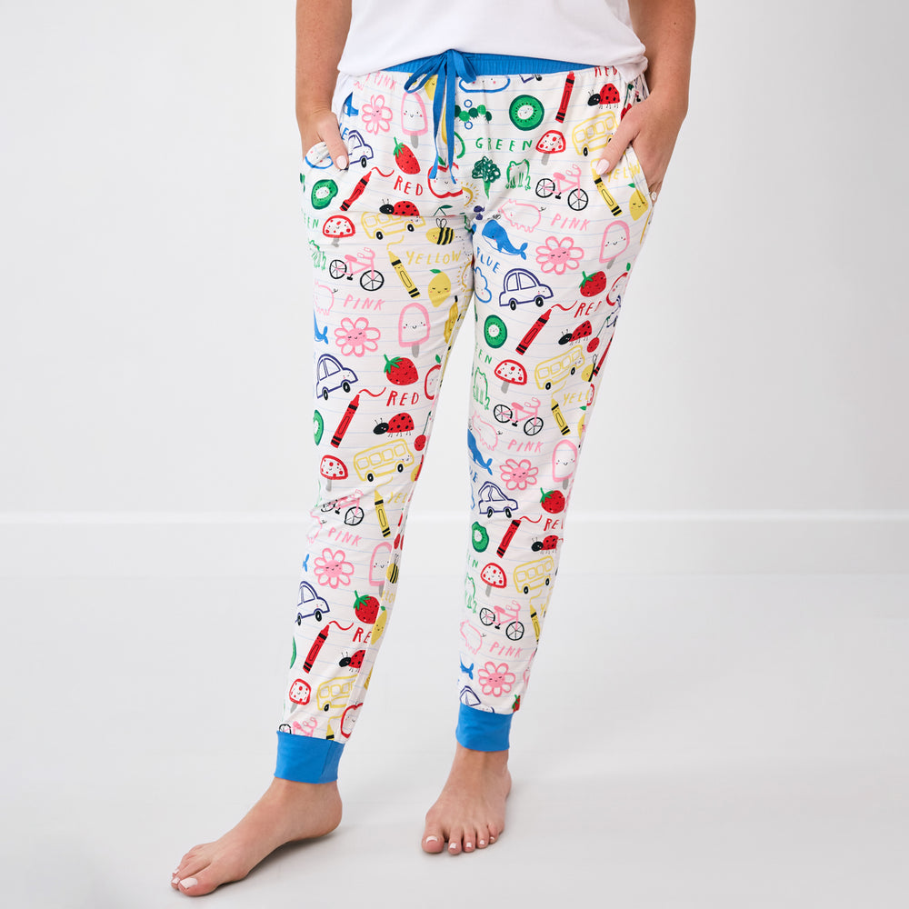 Standing woman wearing the Coloring Crew Women's Pajama Pants