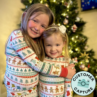Customer capture image of two children wearing Fair Isle two piece pajama sets