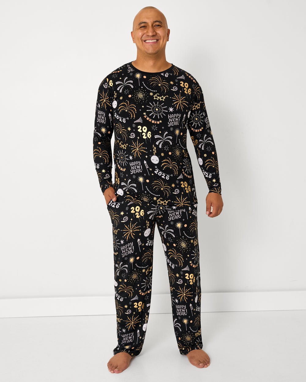 Man wearing the Cozy Countdown Men's Long Sleeve Pajama Top and Pants 