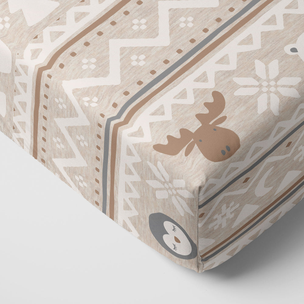 Close up of the corner of the Frosty Fair Isle Fitted Crib Sheet