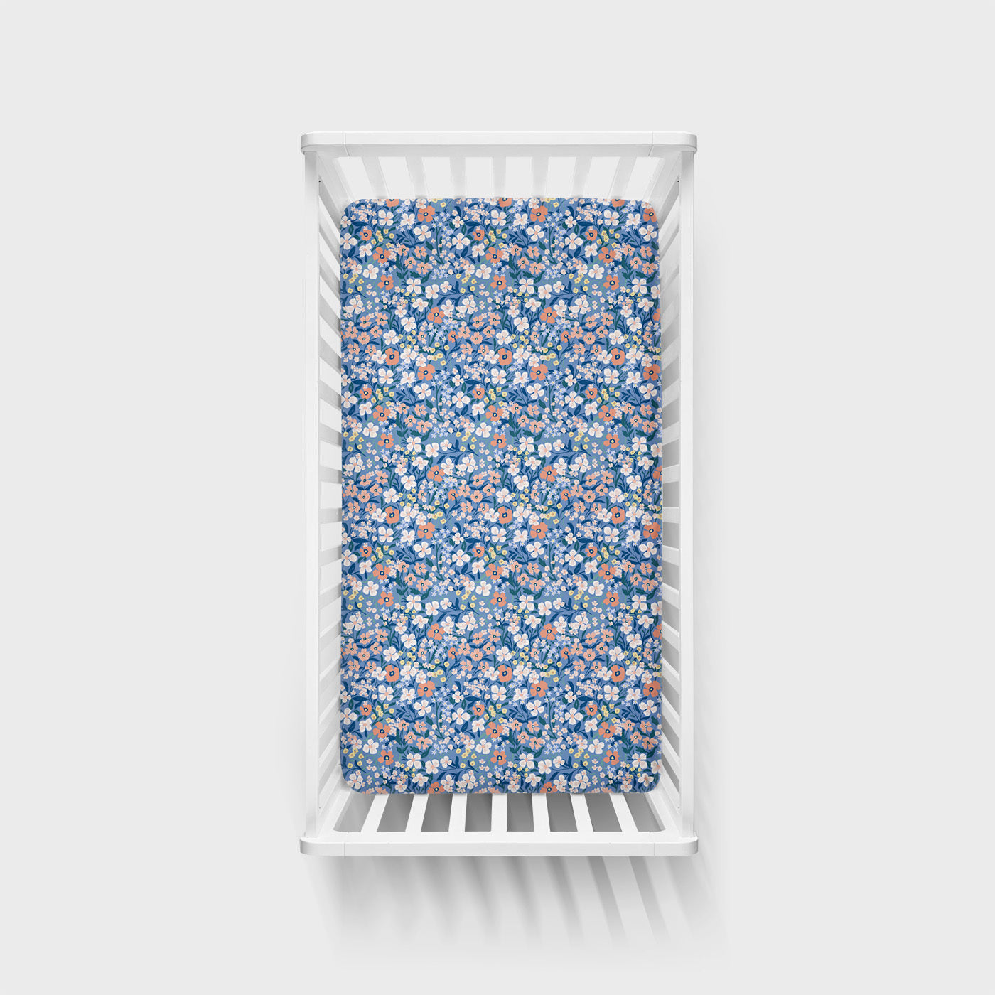 Aerial view of the Petite Petals Fitted Crib Sheet