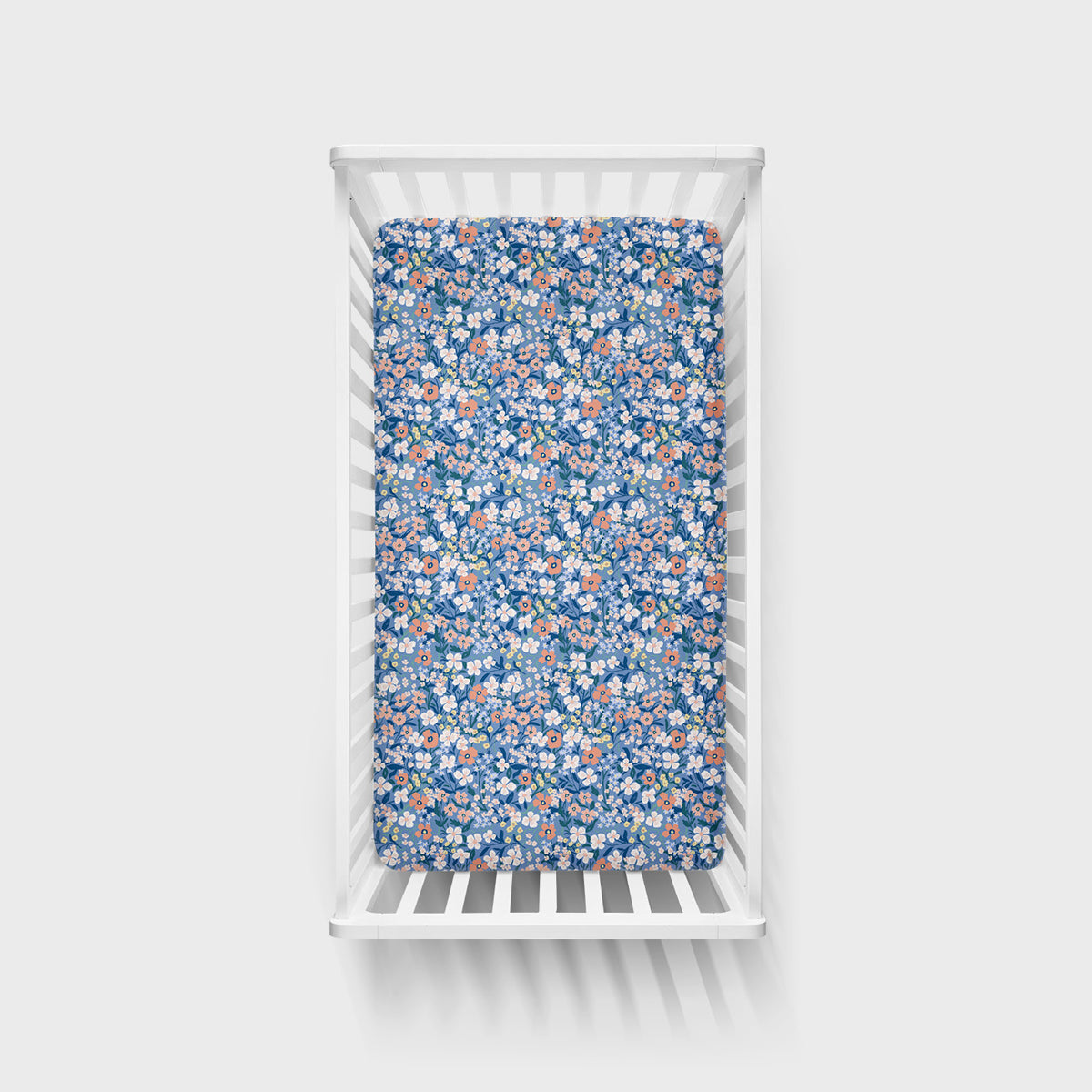 Aerial view of the Petite Petals Fitted Crib Sheet