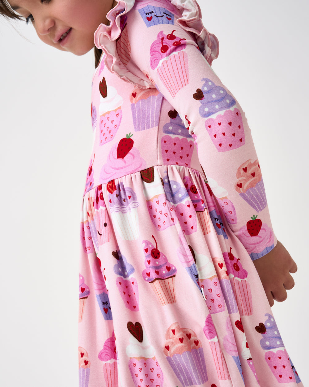 Close up of the gathered skirt on the Cupcake Kisses Flutter Skater Dress