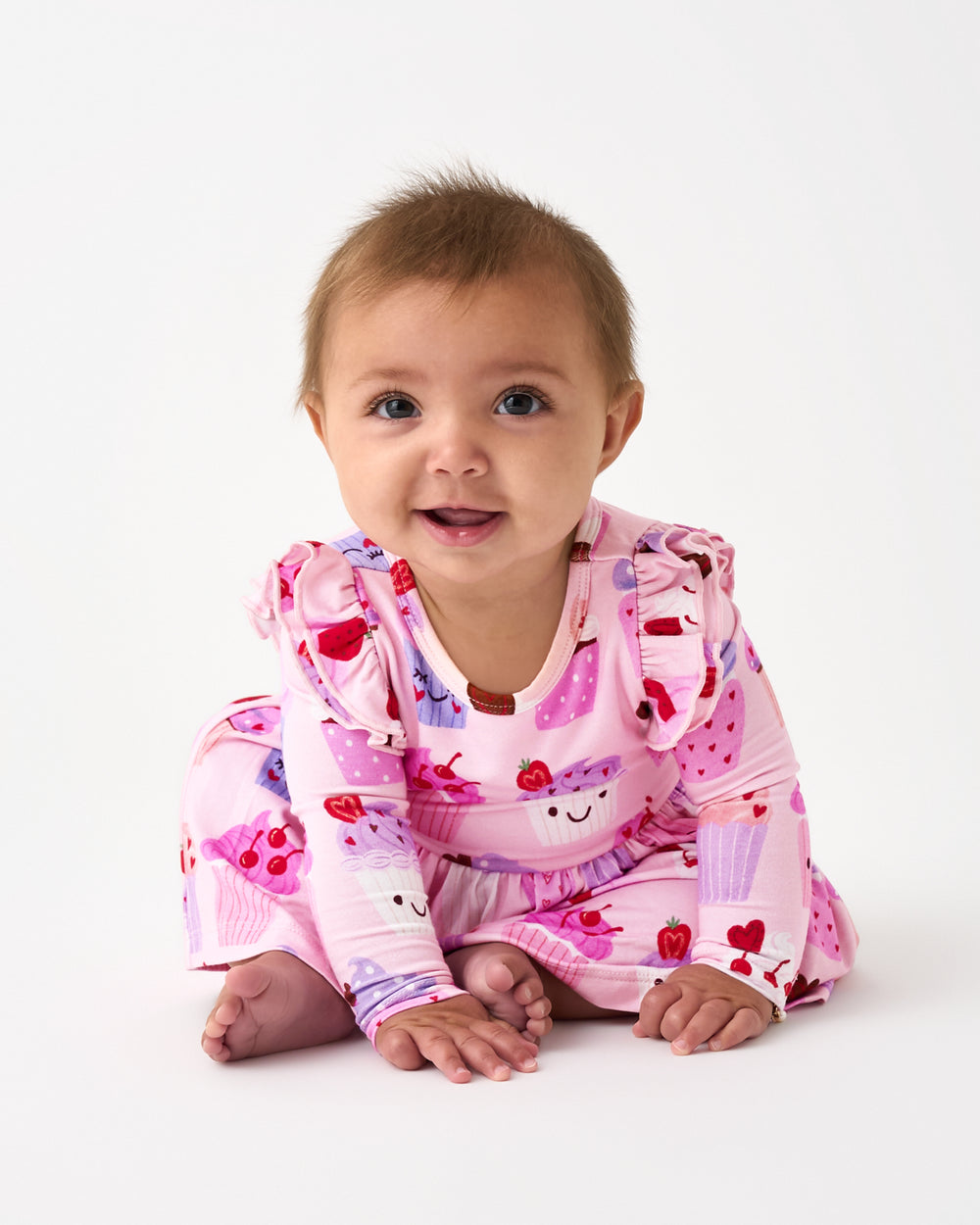 Alternate of sitting baby wearing the Cupcake Kisses Flutter Skater Dress with Bodysuit