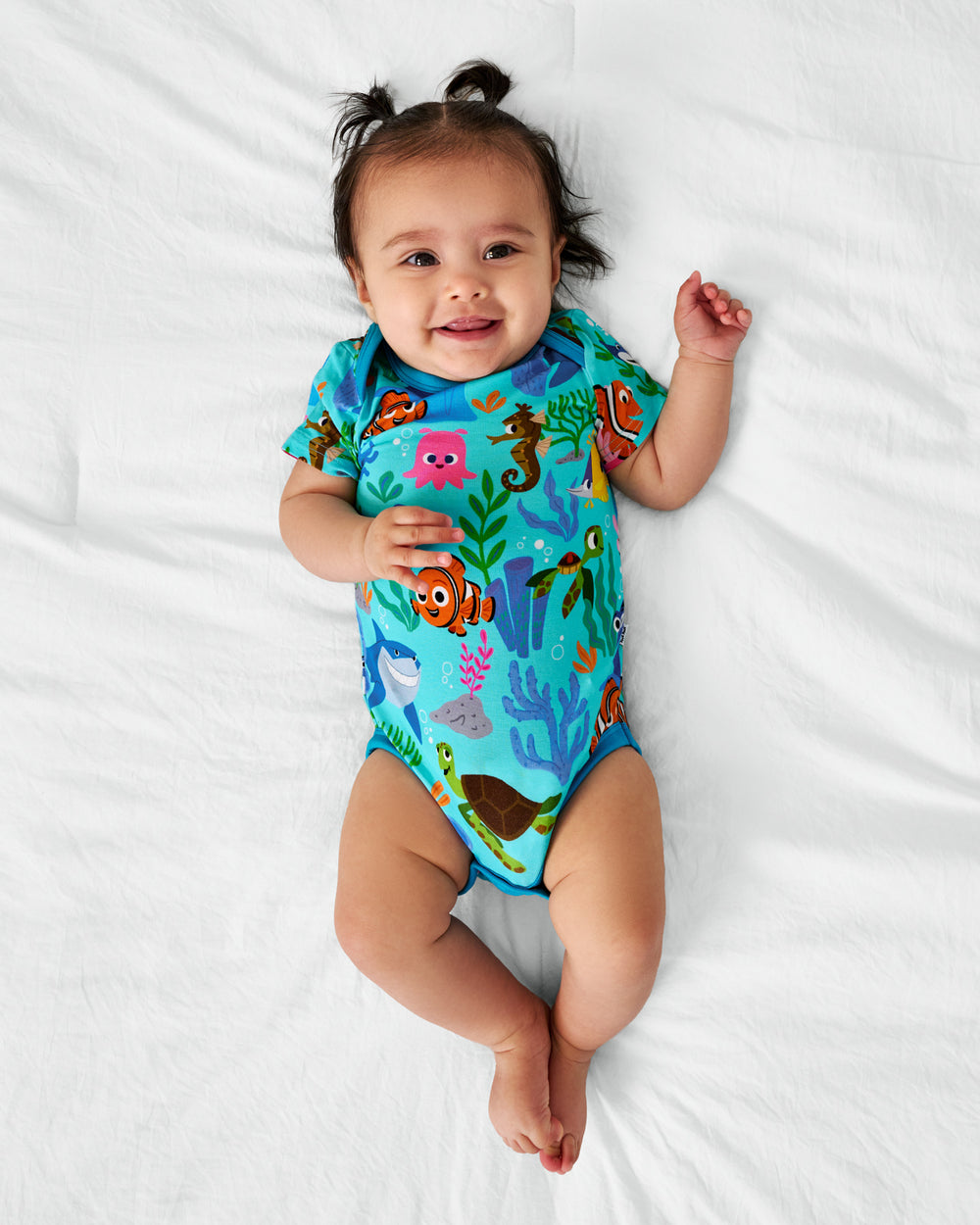 Ariel view of child wearing the Disney Nemo's Reef Bodysuit