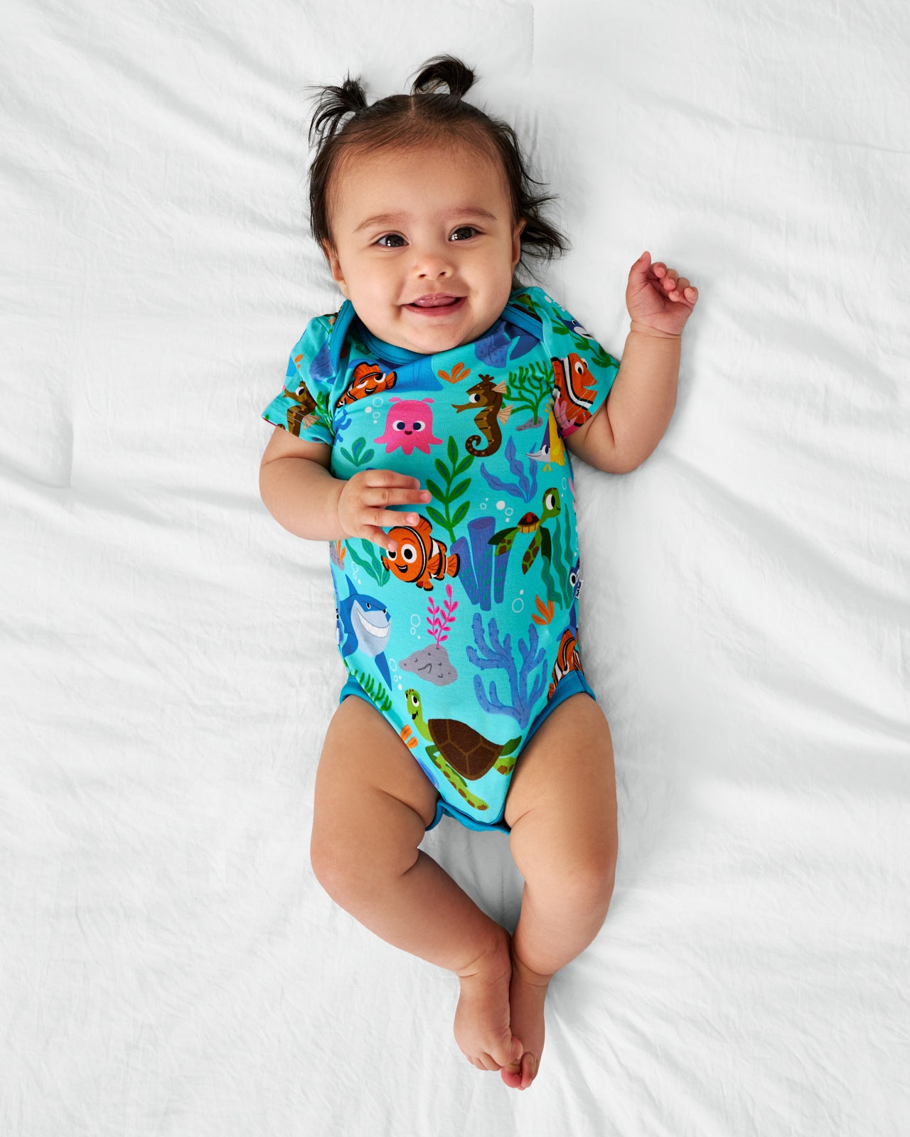 Ariel view of child wearing the Disney Nemo's Reef Bodysuit