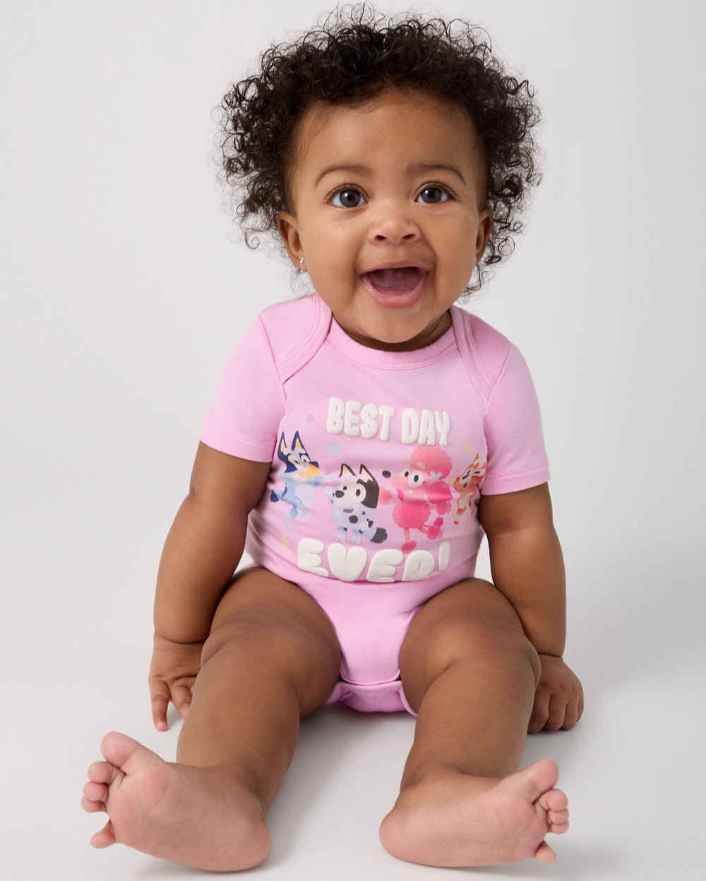 Alternate of sitting baby wearing the Bluey Best Day Ever Bodysuit