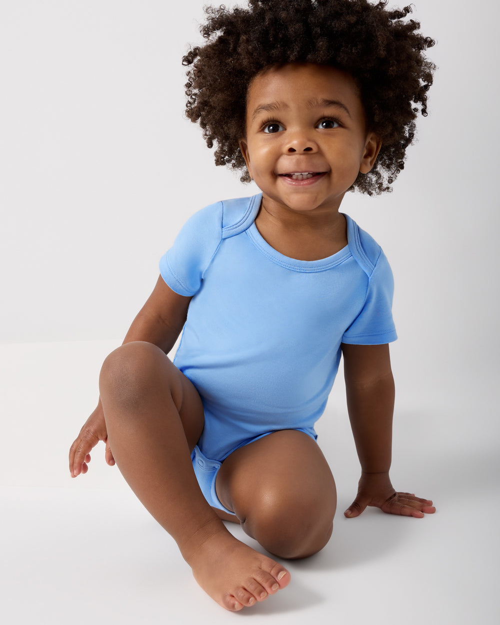 Alternate child wearing the Blue Breeze Short Sleeve Bodysuit