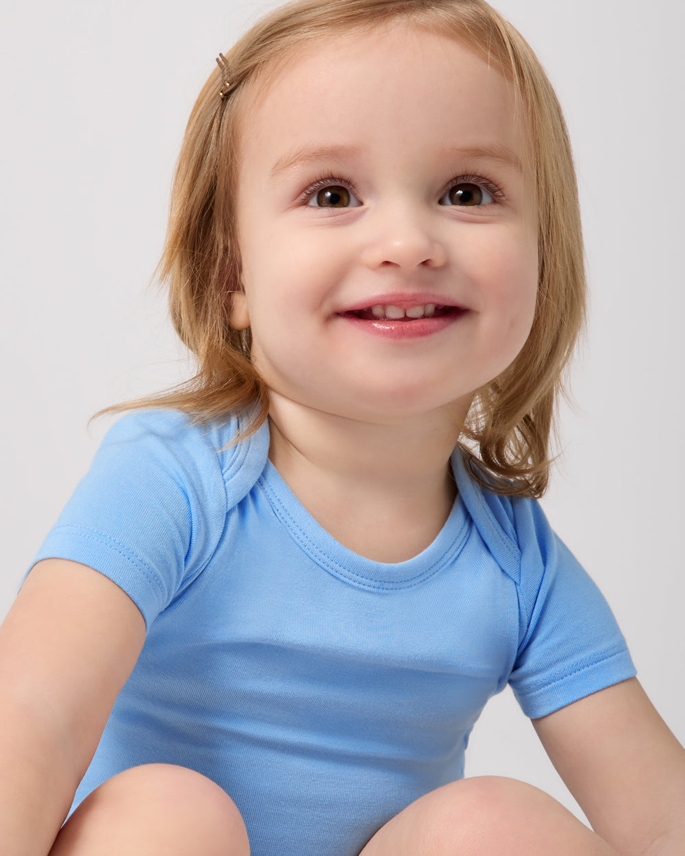 Close up of baby wearing the Blue Breeze Short Sleeve Bodysuit
