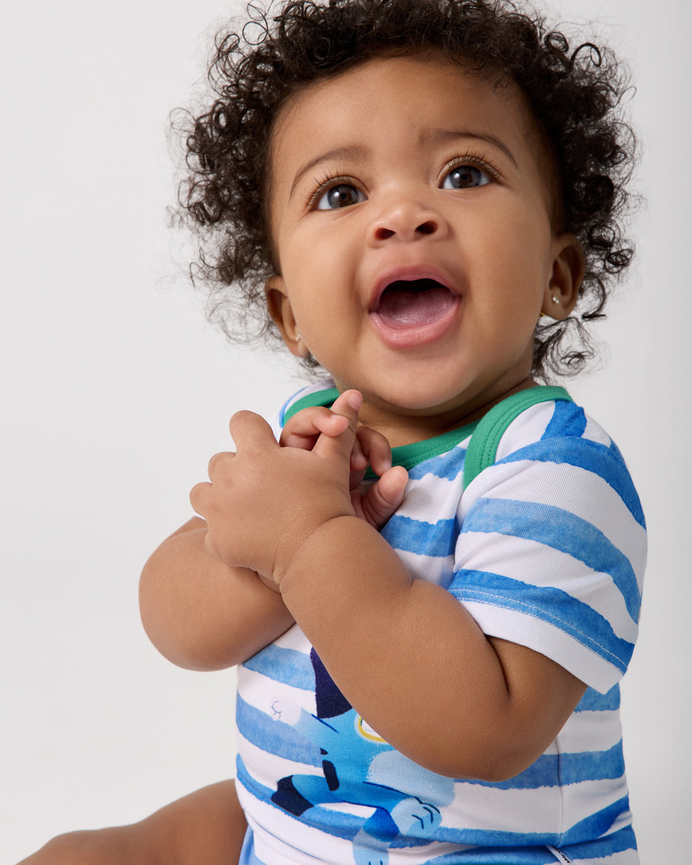 Close up of baby wearing the Bluey Bodysuit
