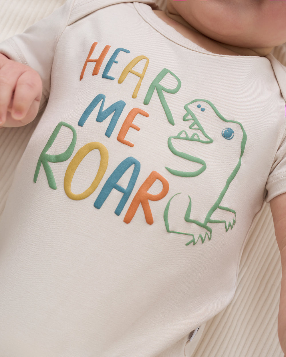Close up of the Hear Me Roar graphic