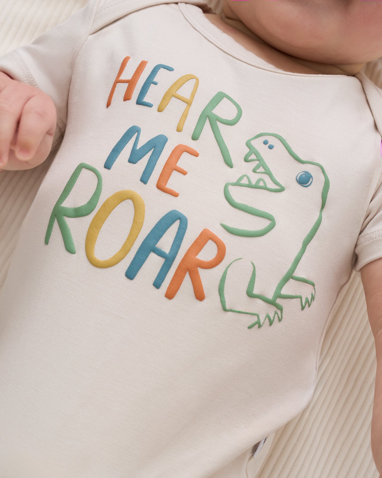 Close up of the Hear Me Roar graphic