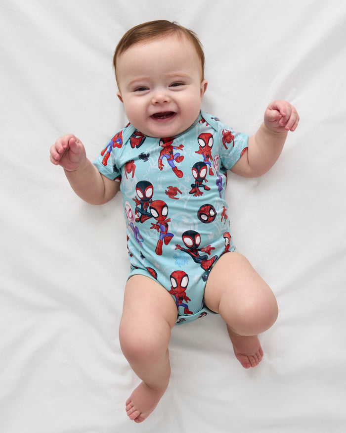 Aerial view of baby wearing the Spidey & Friends Tiny Webs Short Sleeve Bodysuit