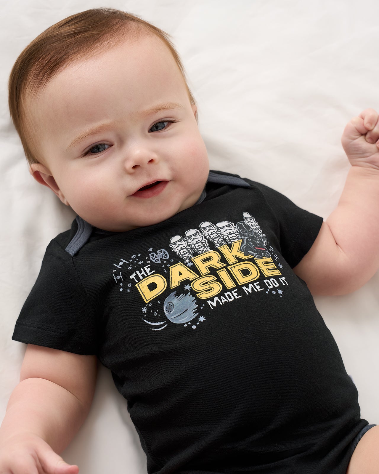 Close up of baby wearing the Star Wars Dark Side Short Sleeve Bodysuit