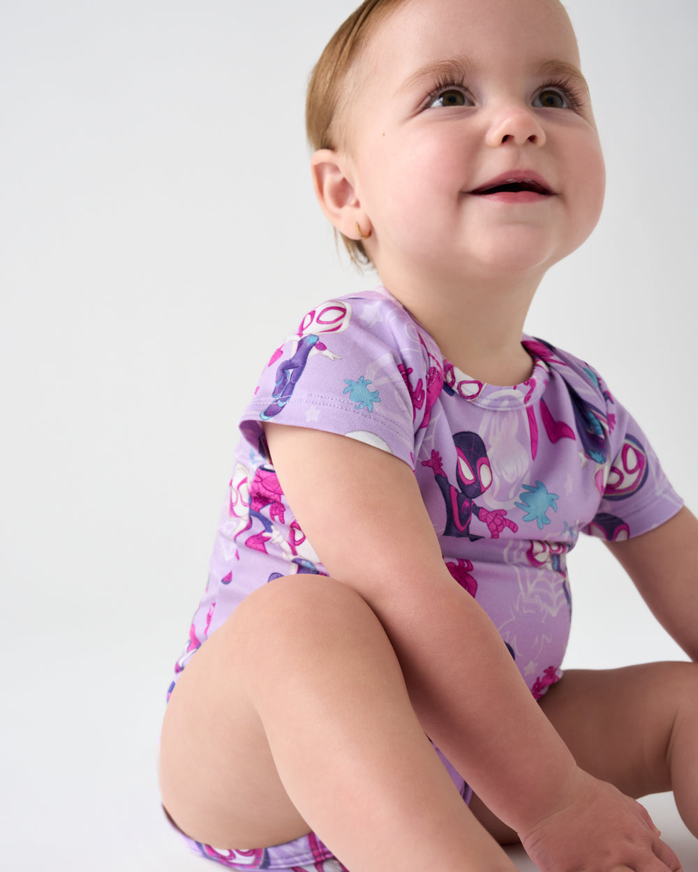 Close up of baby wearing the Spidey & Friends Tiny Webs Short Sleeve Bodysuit
