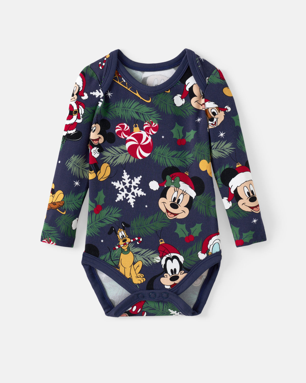 A long-sleeve baby bodysuit featuring a festive Christmas print with Mickey Mouse, Goofy, Pluto, pine trees, candy canes, snowflakes, and Santa hats on a dark navy background.