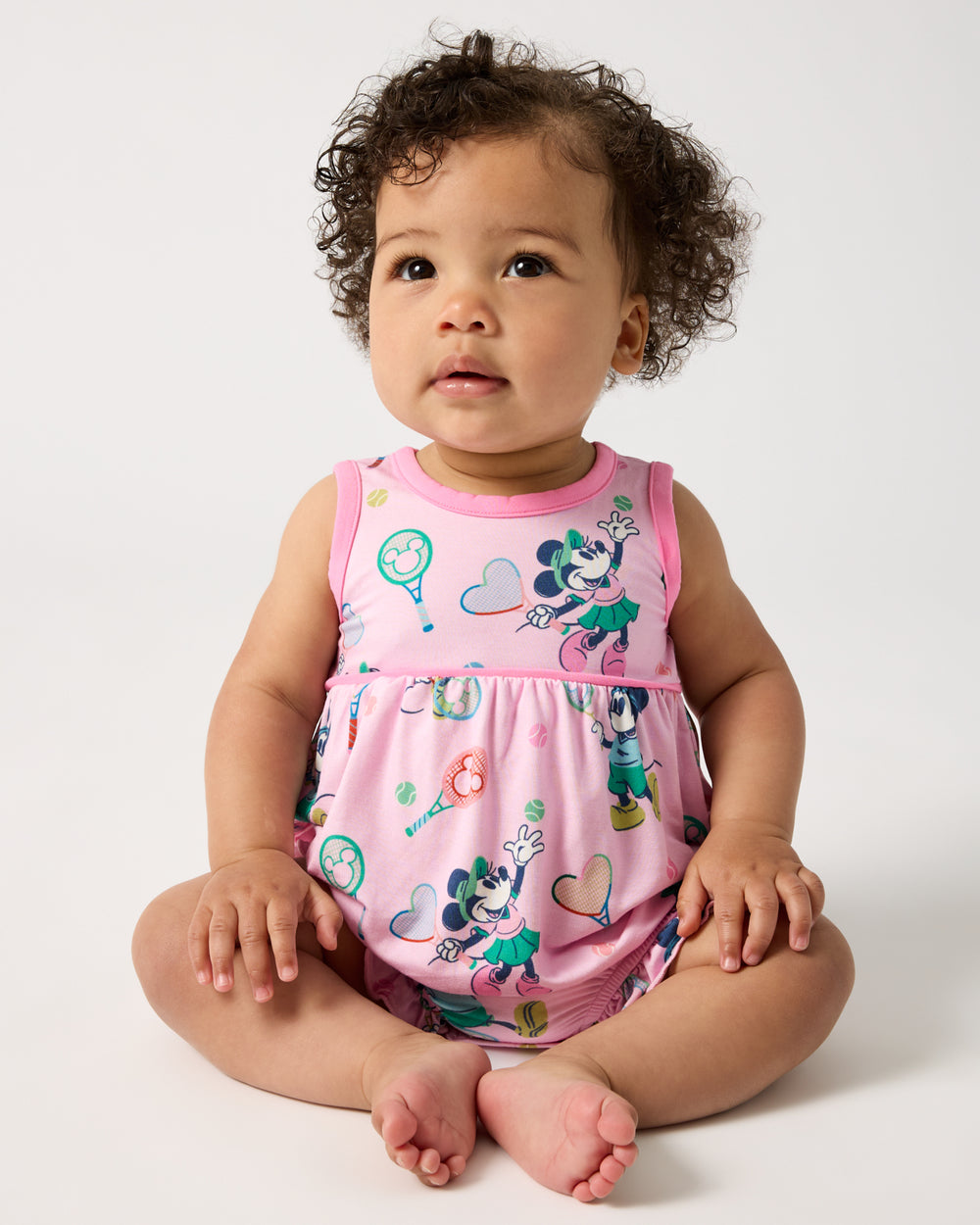 Sitting baby wearing the Disney Mickey Mouse & Minnie Mouse Match Bubble Romper