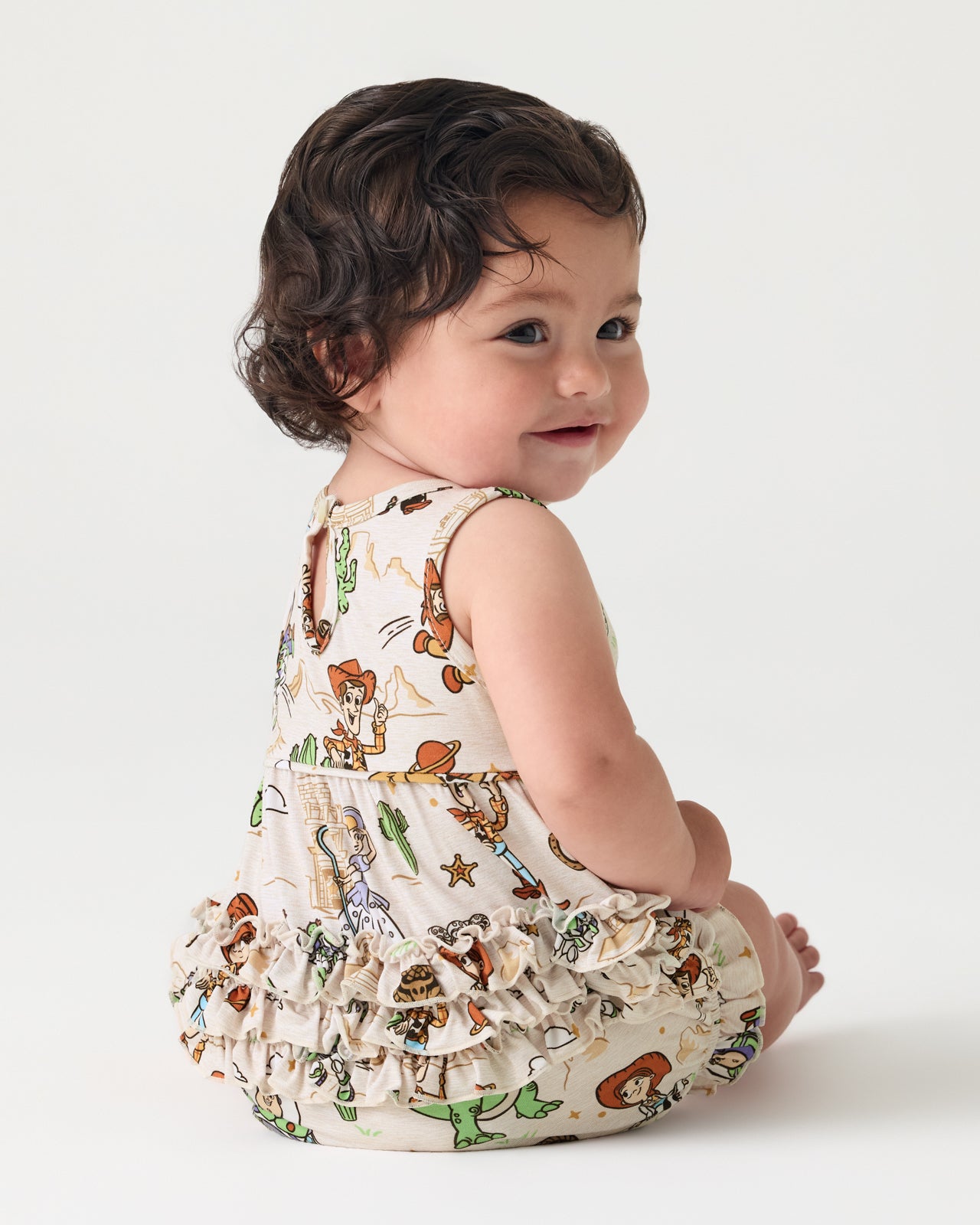 Back view of child wearing the Disney & Pixar Woody's Wild West Bubble Romper