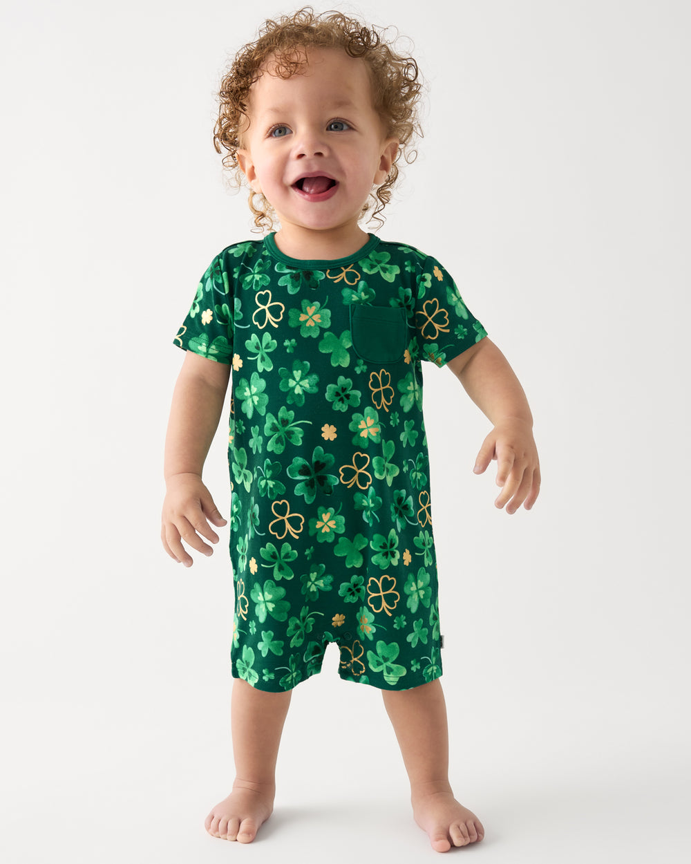 Toddler wearing the Clover Cuties Pocket Shorty Romper