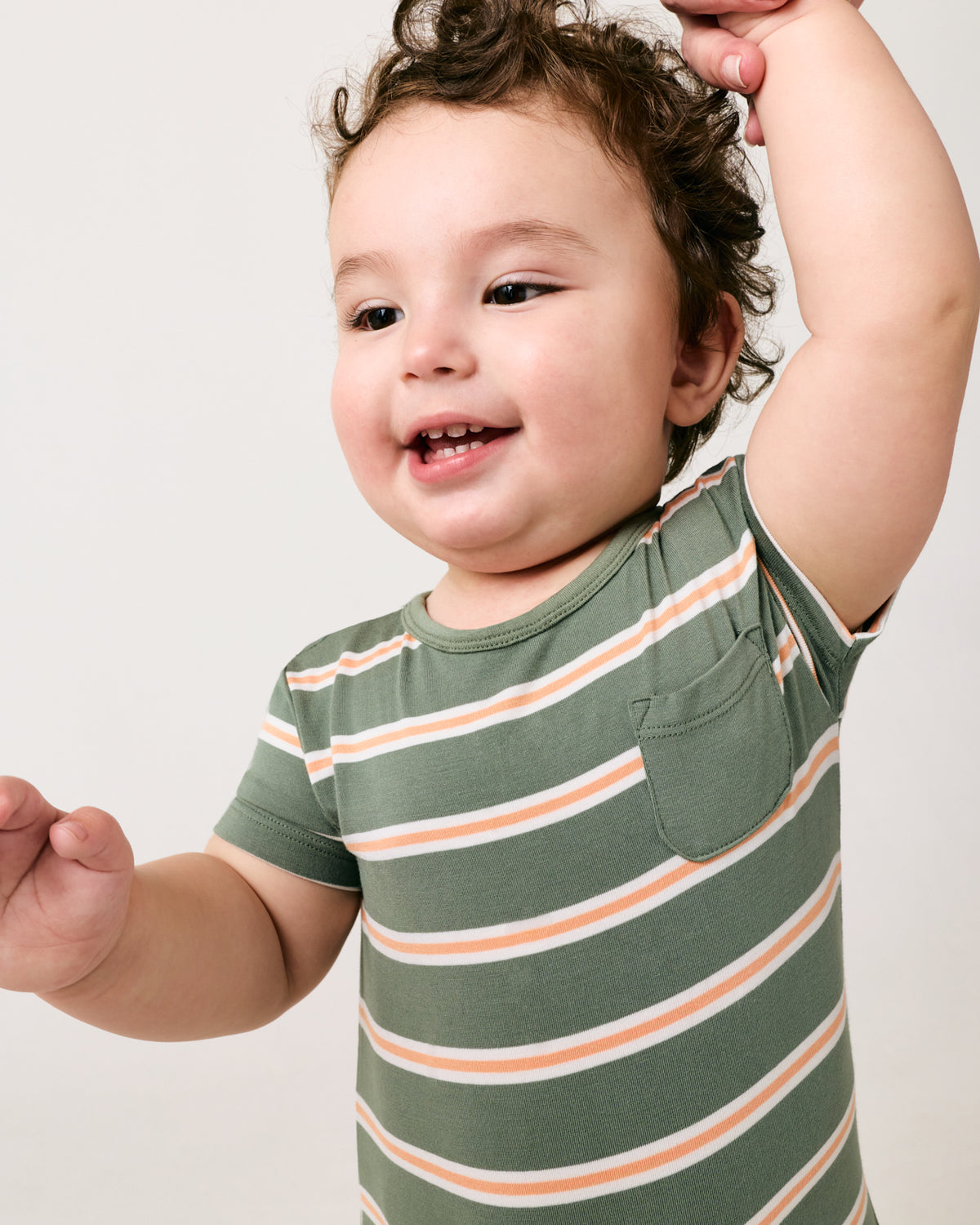 Alternate close up of the Bold Moss Stripe Pocket Shorty Romper