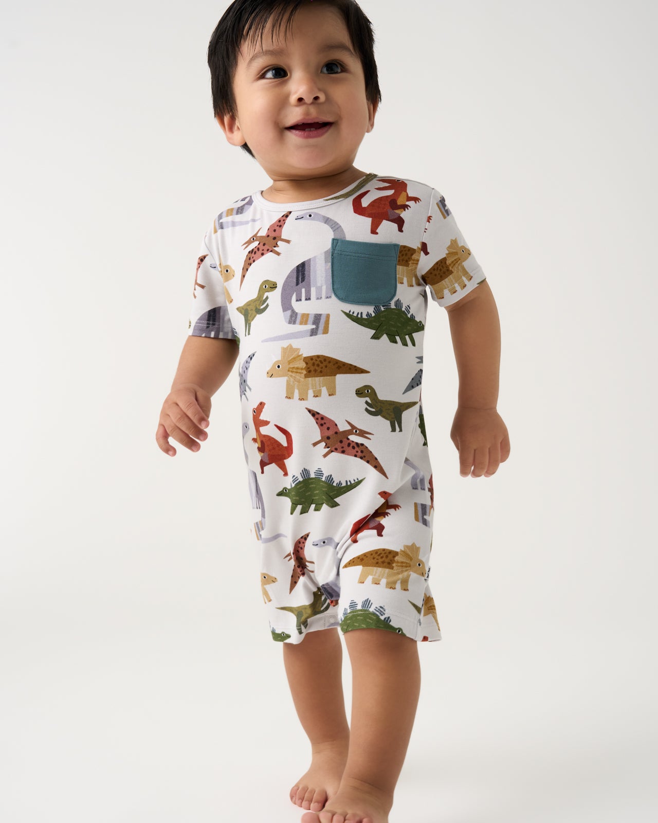 Toddler wearing the Roar & Explore Pocket Shorty Romper