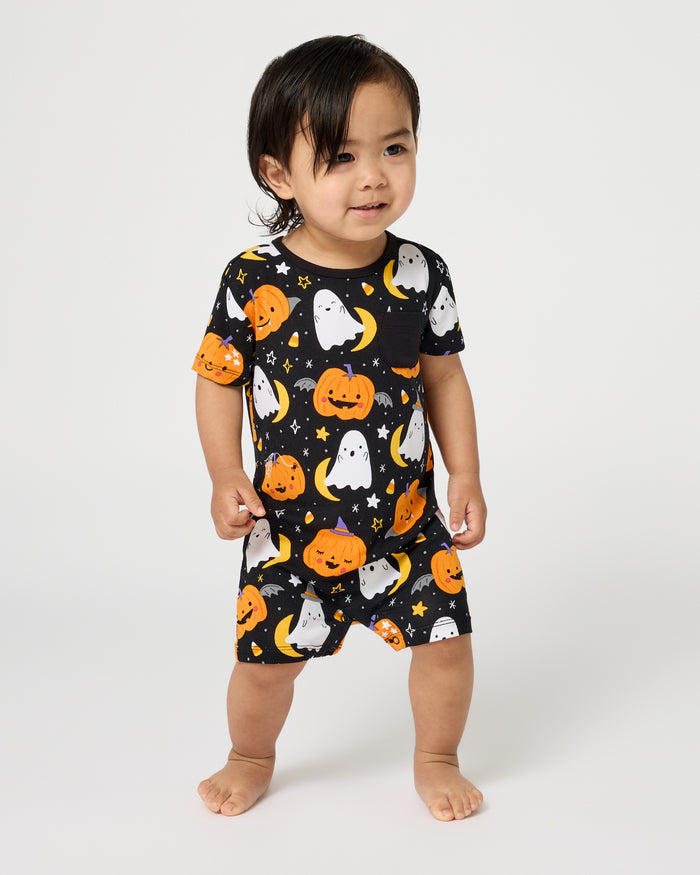 Standing toddler wearing the Moonlit Magic Pocket Shorty Romper