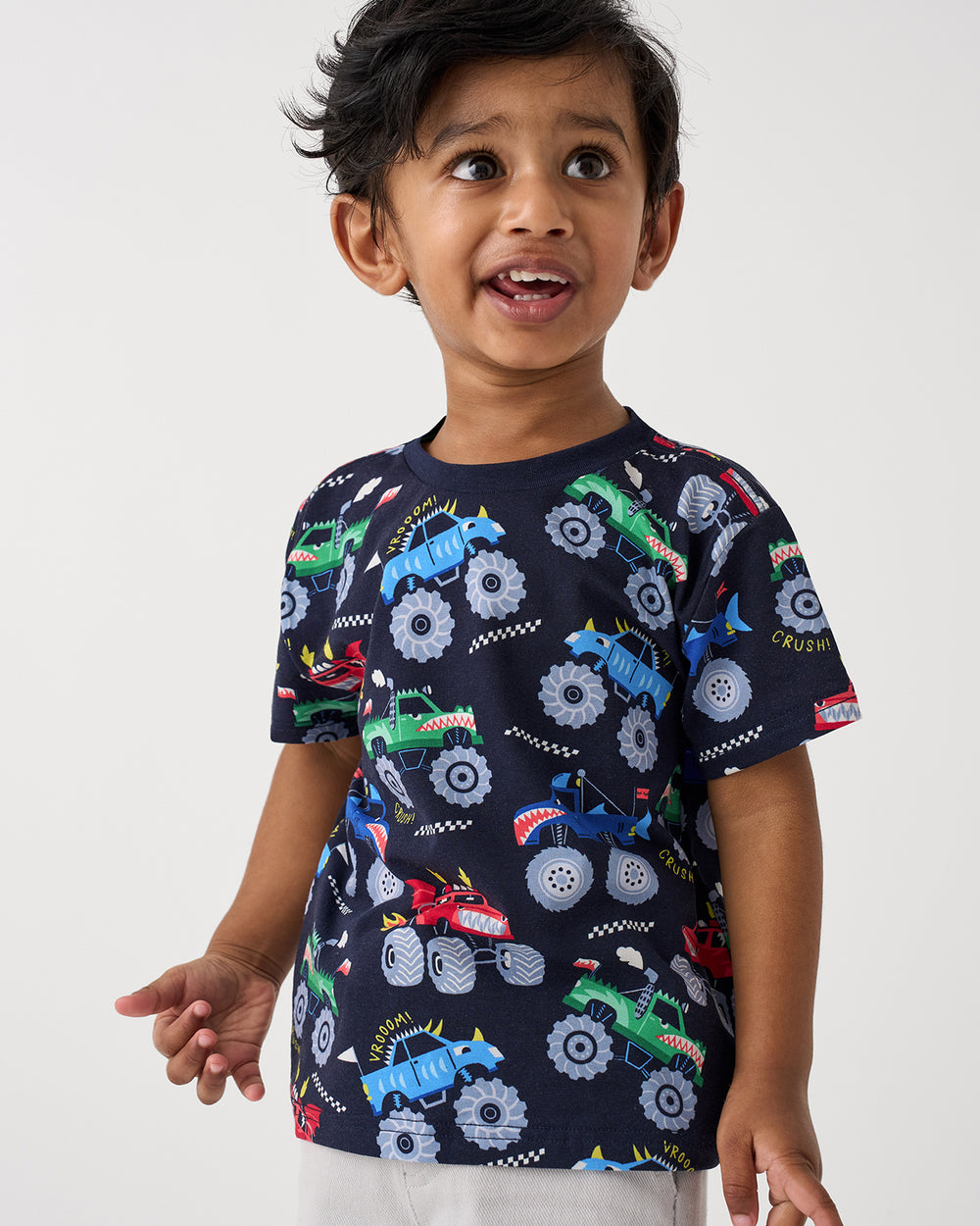Close up of boy wearing the Monster Truck Madness Relaxed Tee