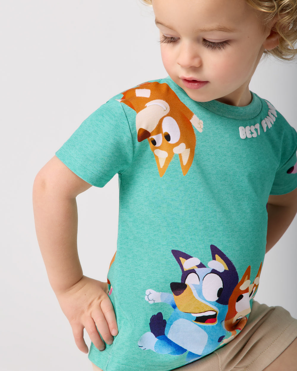 Close up of boy wearing the Bluey Friends Forever Relaxed Tee