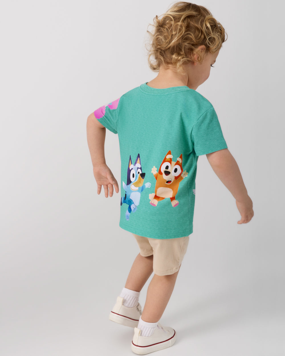 Back view of boy wearing the Bluey Friends Forever Relaxed Tee