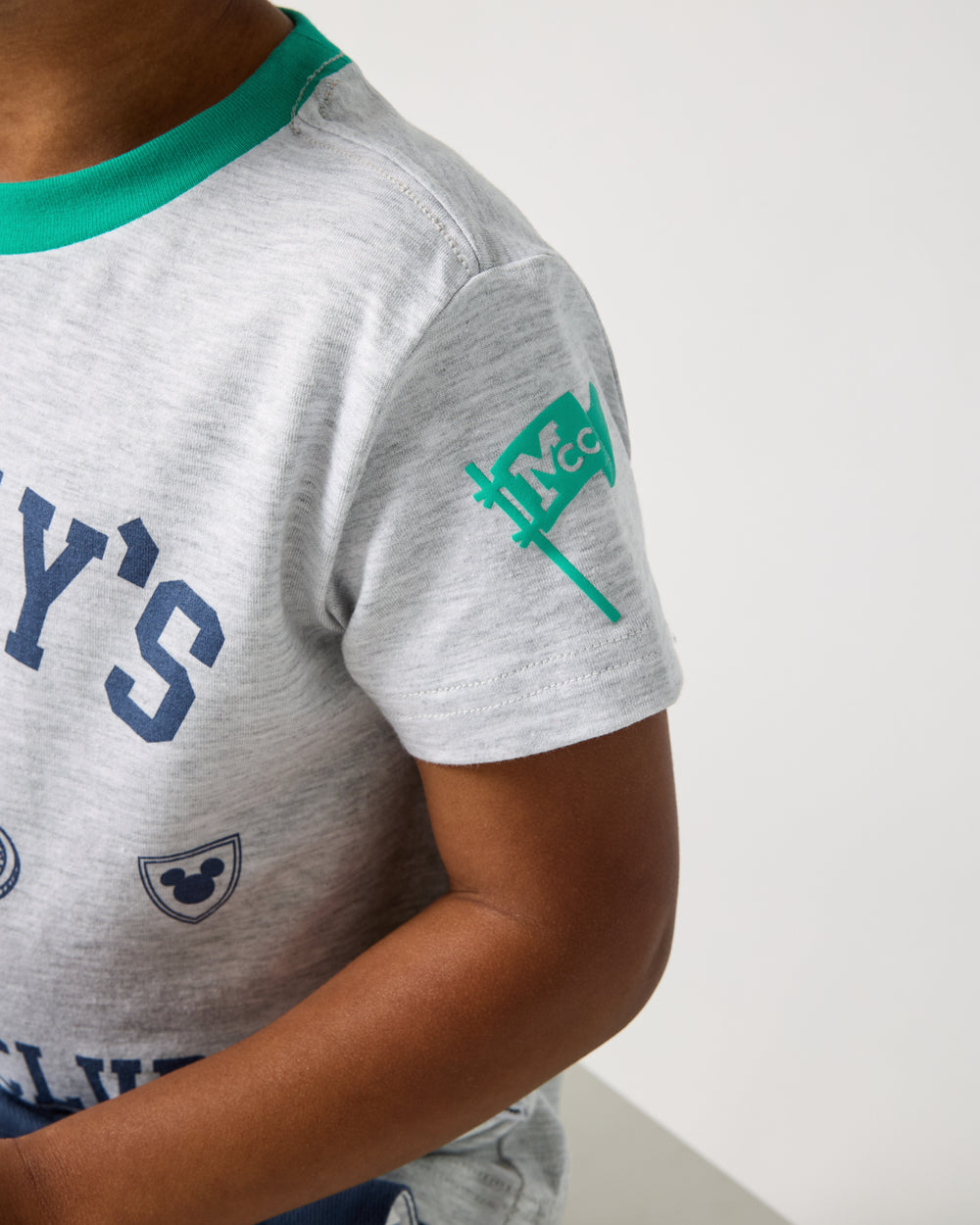 Close up of the Disney Mickey Mouse Sports Club Relaxed Tee sleeve