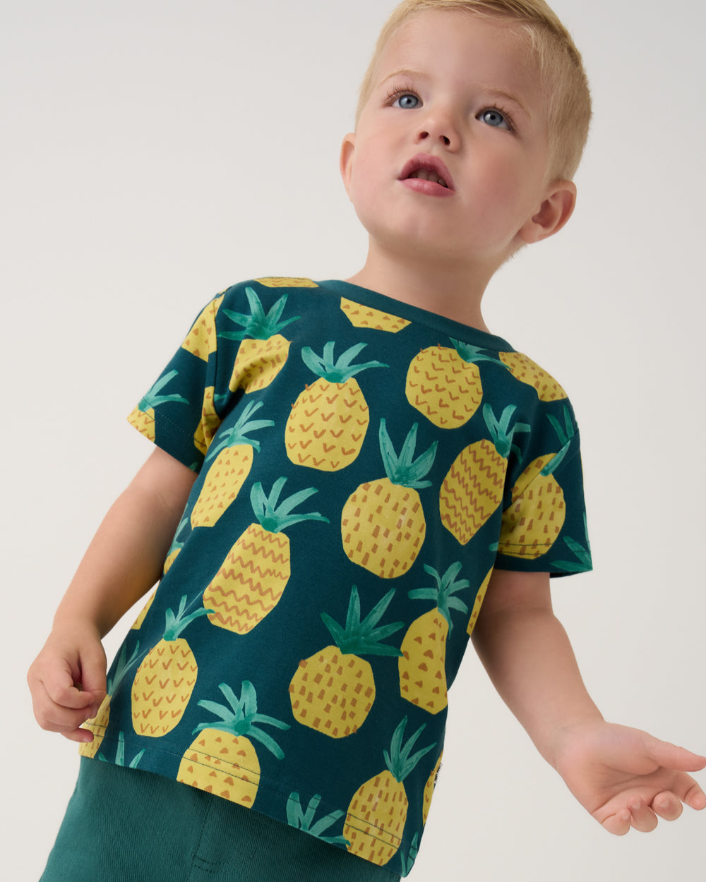 Child wearing the Pineapple Grove Relaxed Tee