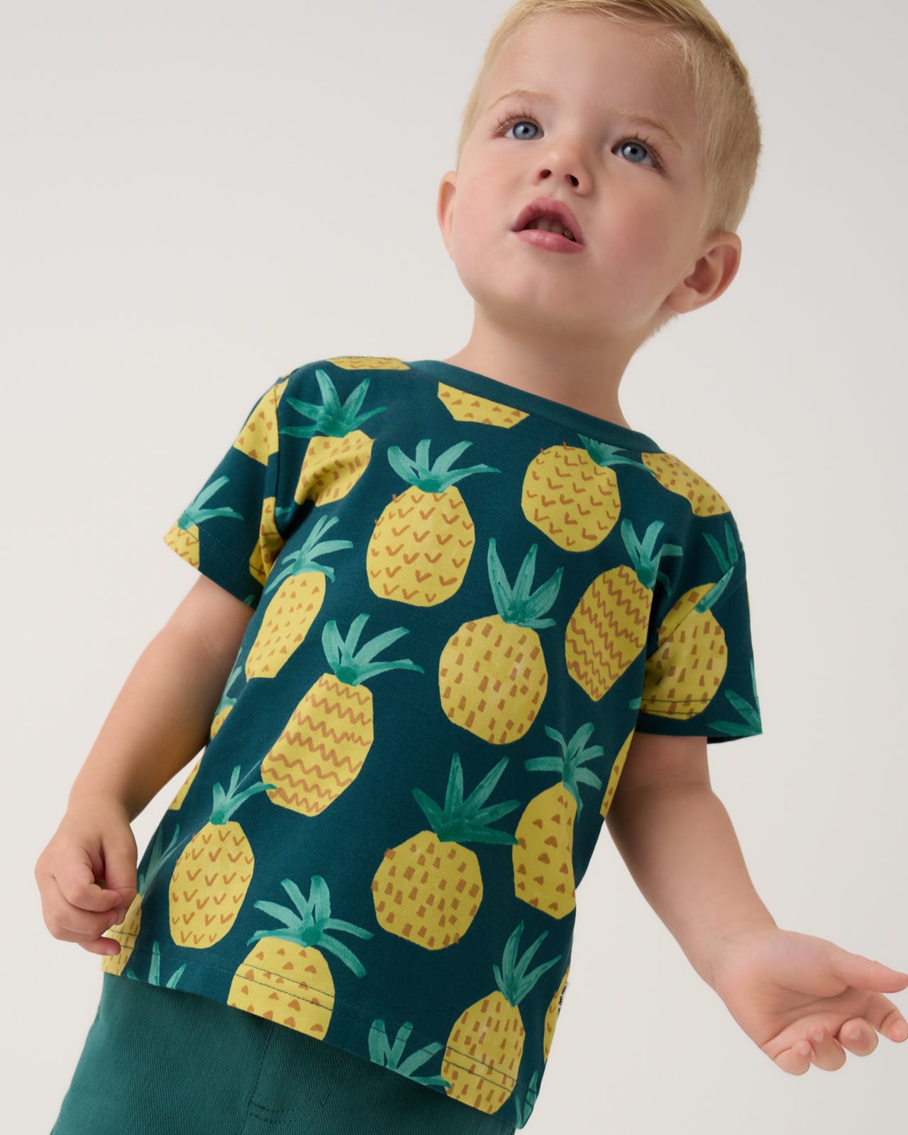 Child wearing the Pineapple Grove Relaxed Tee