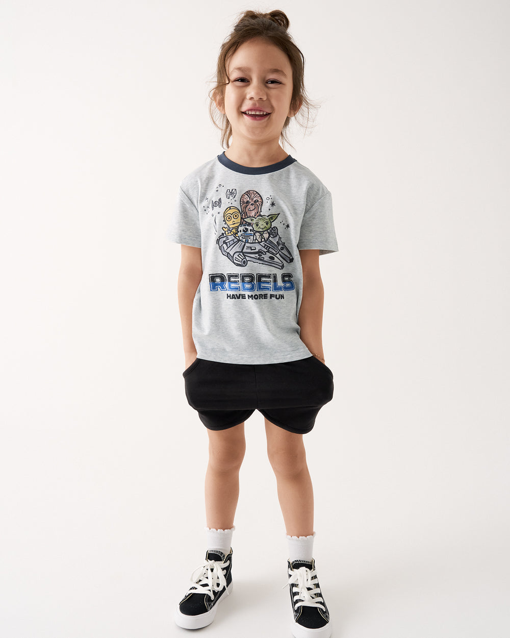 Girl wearing the Star Wars Little Rebels Relaxed Tee with black girls shorts 