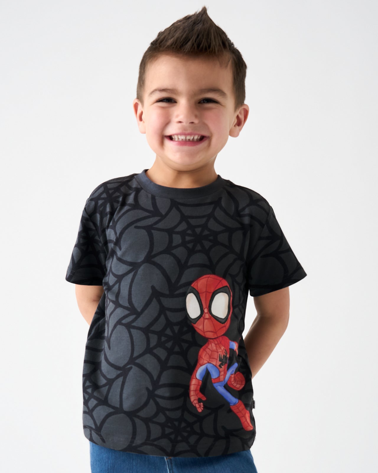 Close up of boy wearing the Spidey & Friends Relaxed Tee