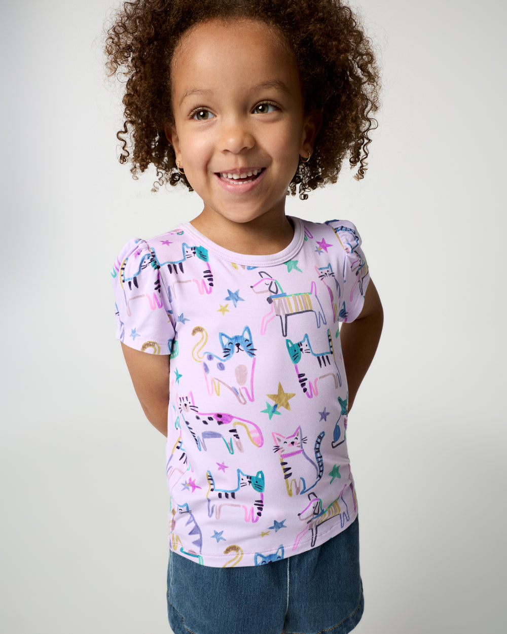 Girl wearing the Whiskers & Wags Purple Puff Sleeve Tee