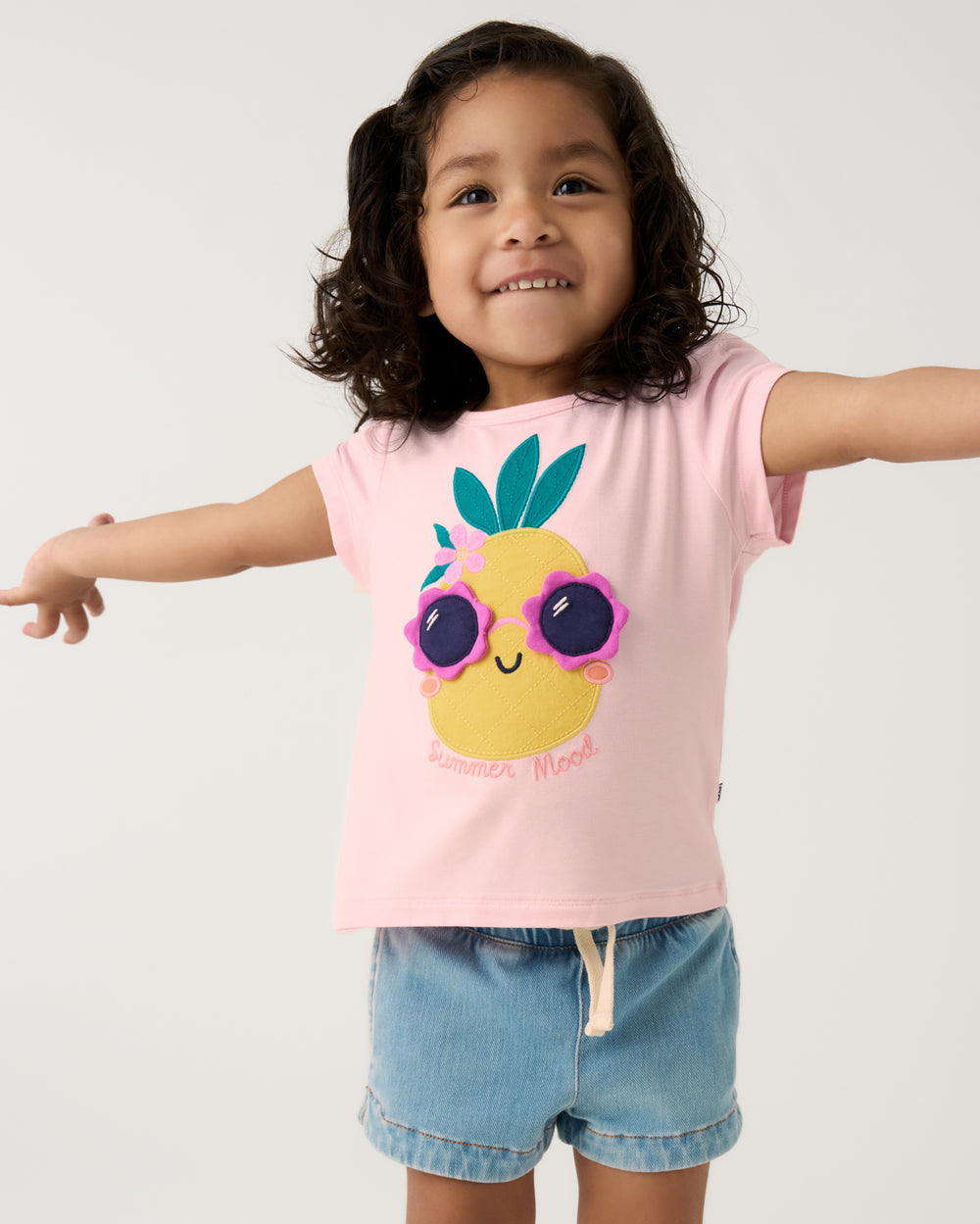 Alternate girl wearing the Summer Mood Puff Sleeve Tee with denim shorts