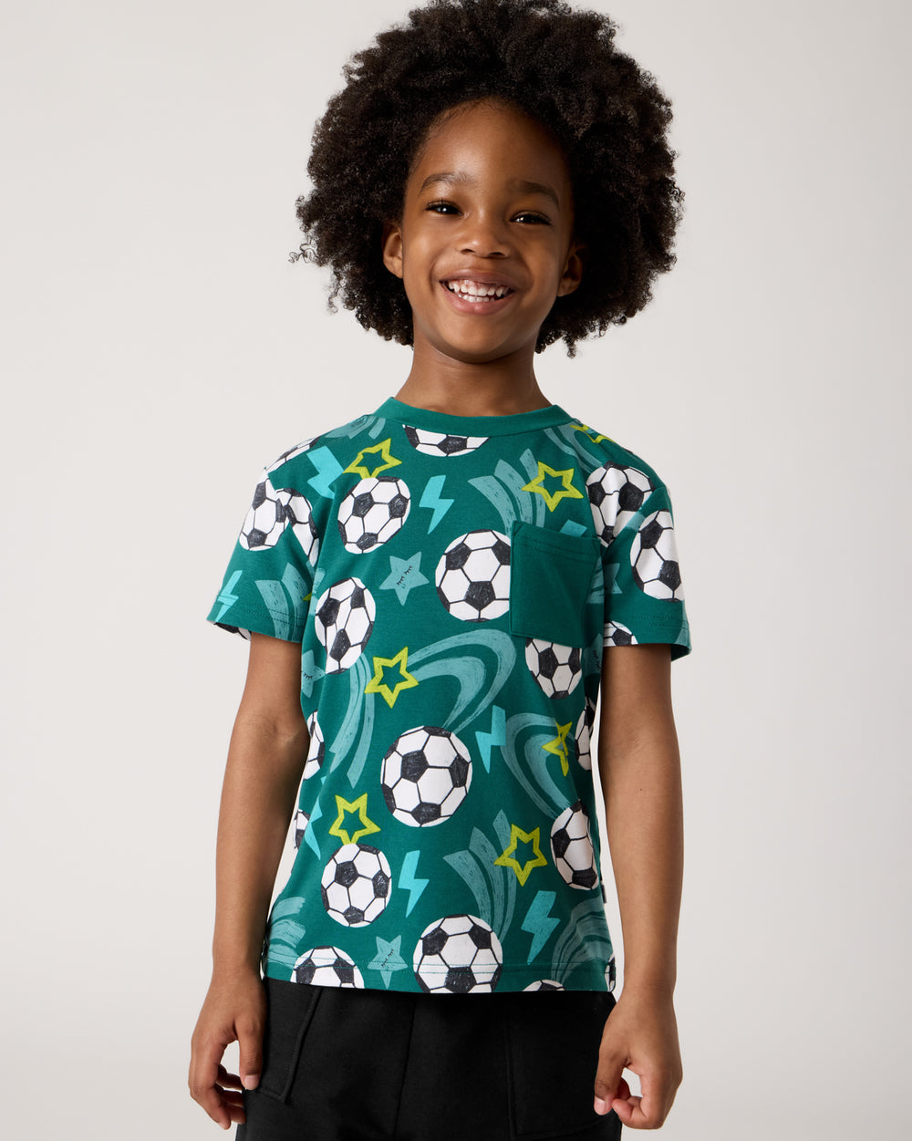 Boy wearing the Soccer Stars Relaxed Pocket Tee
