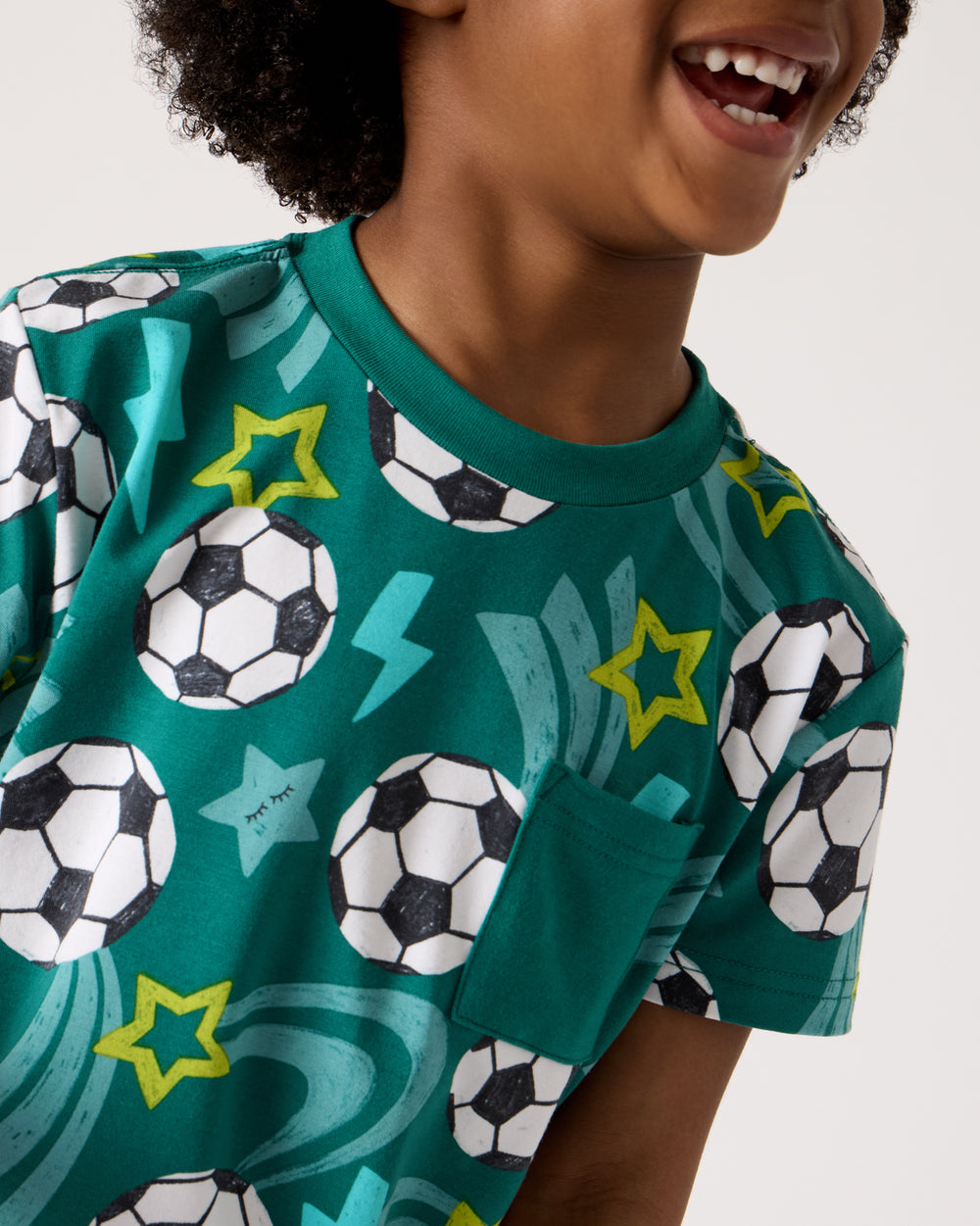 Close up of the pocket detail on the Soccer Stars Relaxed Pocket Tee