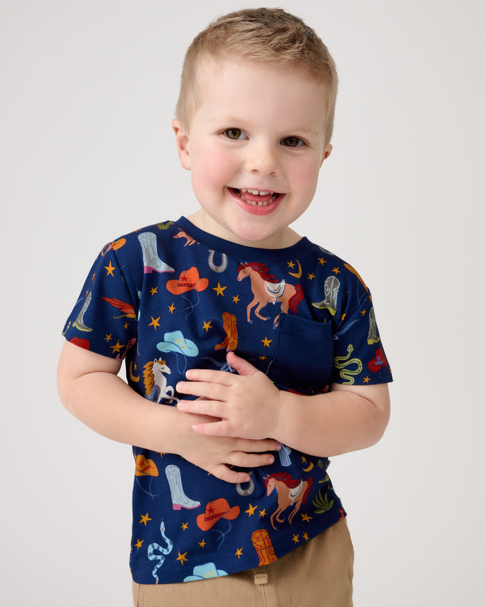 Close up of boy wearing the Blue Rancher Roundup Relaxed Pocket Tee