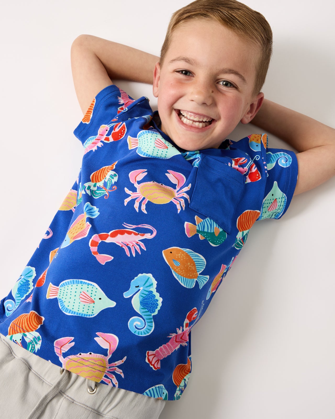 Boy wearing the Tidepool Party Relaxed Pocket Tee