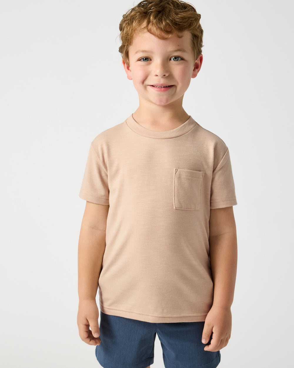 Boy wearing the Sand Bar Relaxed Pocket Tee