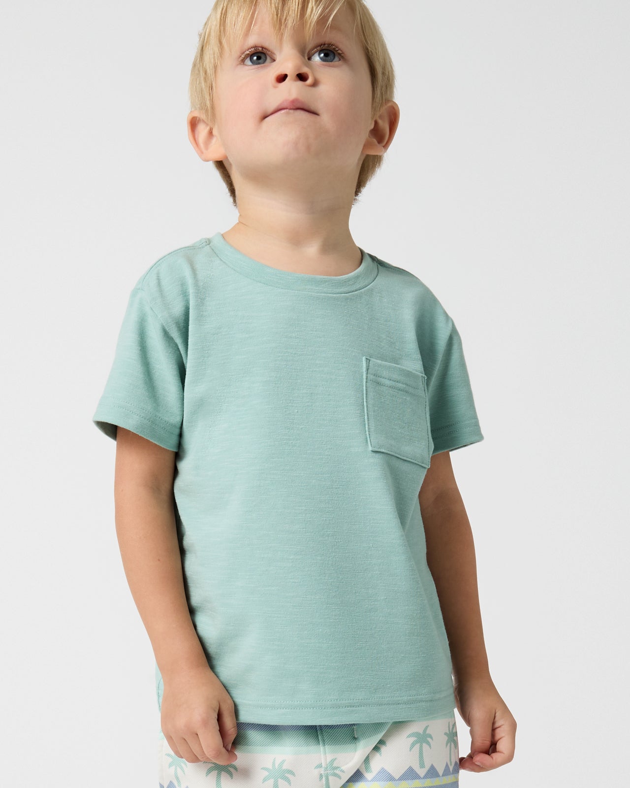 Boy wearing the Aqua Surf Relaxed Pocket Tee